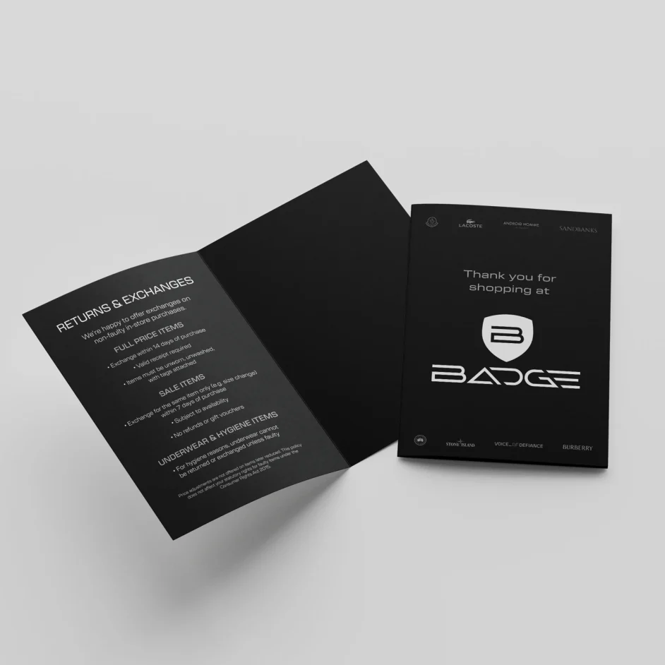 Badge Clothing black, sleek receipt wallet design.